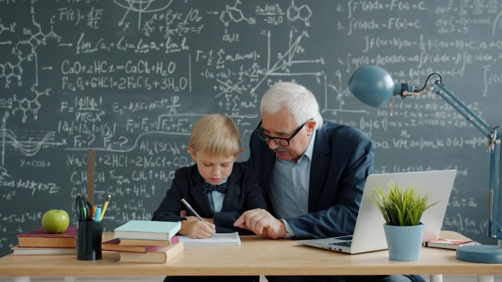 Elderly teacher helps young student with math